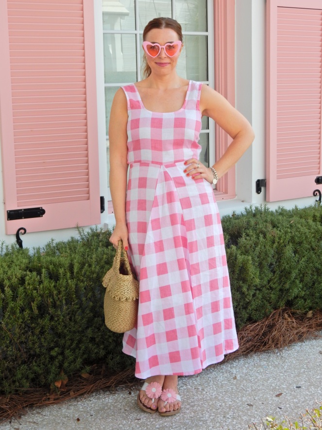 Pink Dress with Pink Sunglasses in front of Pink House